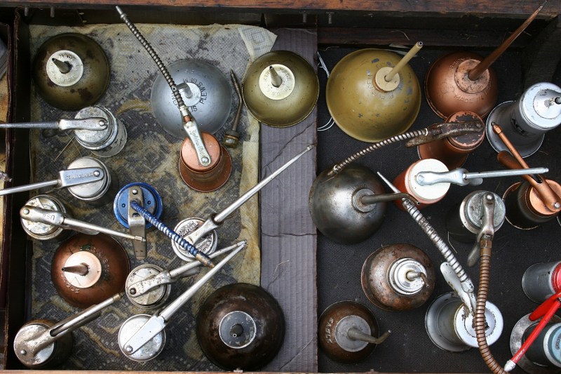Vintage oil cans grabbed my attention at the flea market.