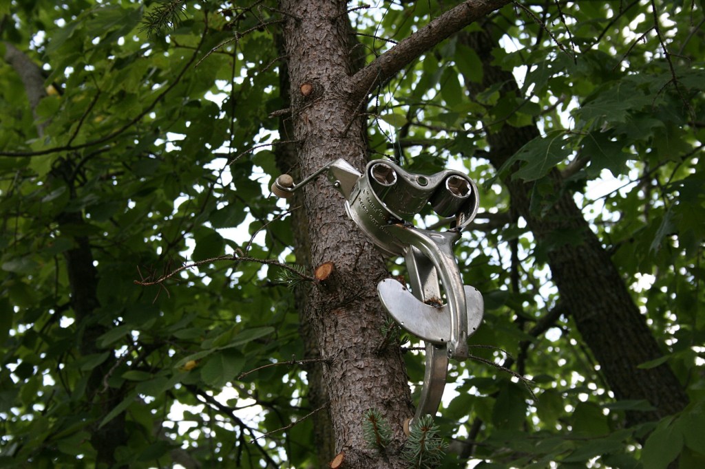 Who thinks of using a vintage meat grinder for art, then suspending it in a tree? Steve.