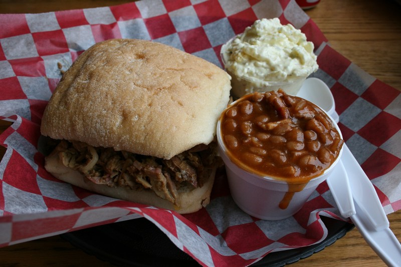 My Southern BBQ Pork Sandwich served with savory baked beans and potato salad.