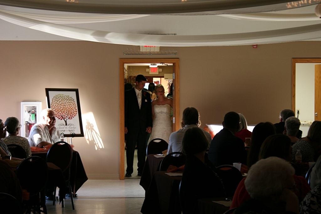 Jared and Carlyn await their introduction and entry into the reception hall.