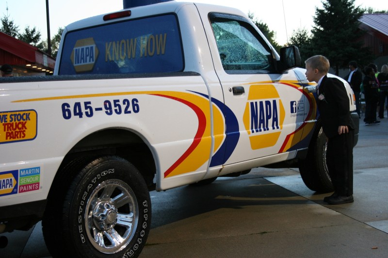 The ring bearer was especially interested in the NAPA truck, peering inside and trying the door.