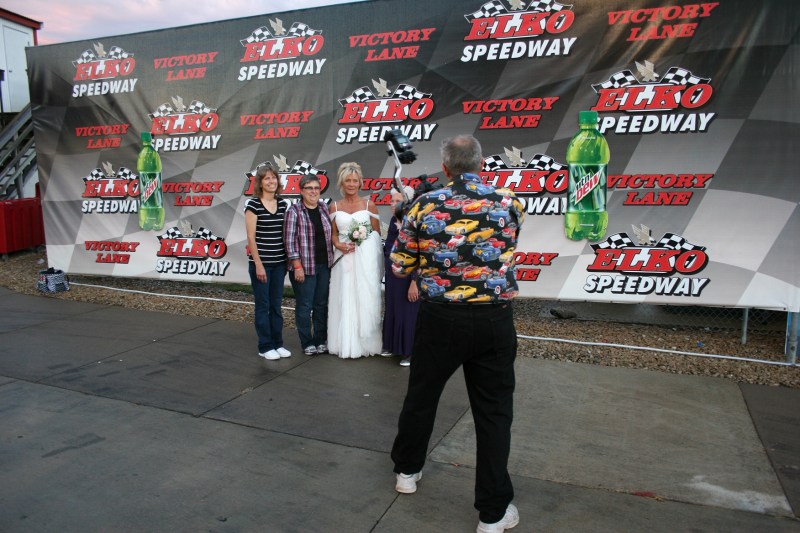 I was as much interested in the bride as the shirt worn by the professional photographer.