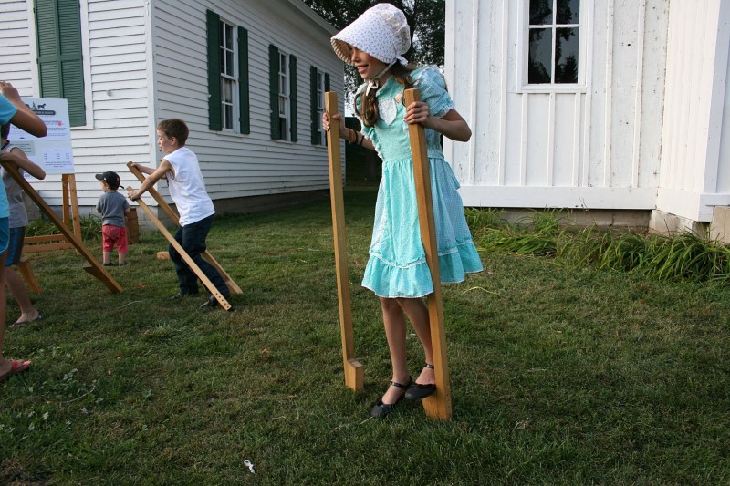 Kids loved trying to walk on stilts.