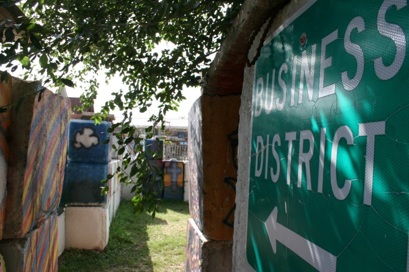 This sign does not point to downtown Mason City, but rather to a quirky and interesting attraction.