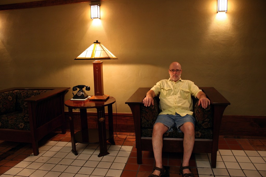 My husband kicks back in an historic building that draws lots of interest.