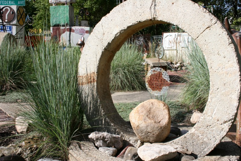 I really liked this circular garden art placed next to ornamental grass.