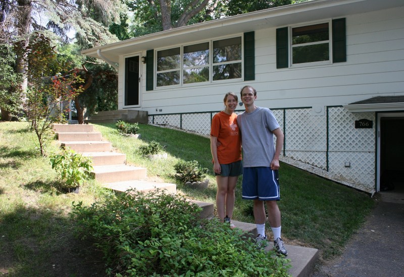 My eldest daughter, Amber, and her husband, Marc, pose in front of the home they recently purchased in a Twin Cities suburb. Minnesota Prairie Roots file photo.