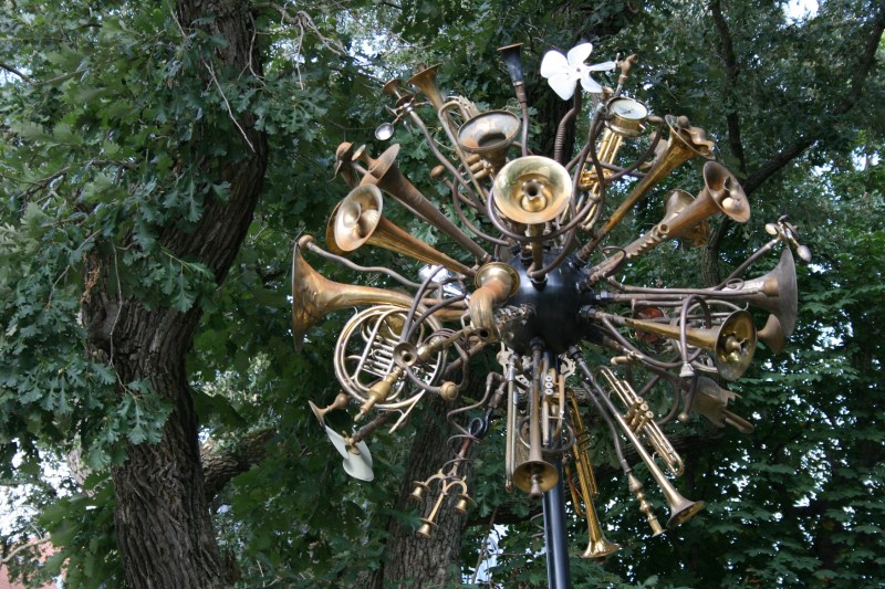 "Kinetic Weather Disturbance Ensemble," a sculpture by Douglas Walker, is located at one end of the bridge. It is now part of the city's permanent sculpture collection.