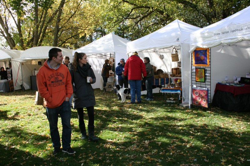 Artists shelter in tents.