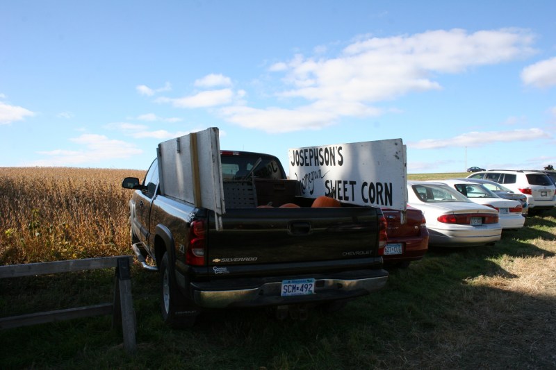 Parked in the parking area along the farm drive.