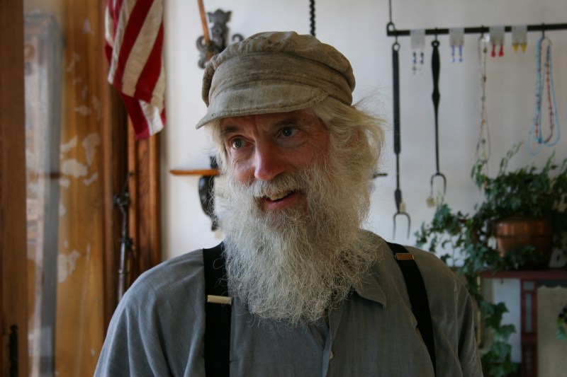 Tom looks the part of a craftsman.