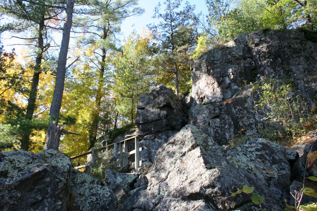 Railings are welcome along rocky walls.