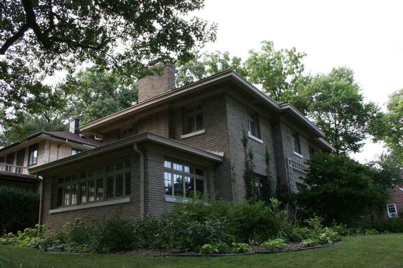 The 1920 George Romey House was designed by J.M. Felt & Co. with Prairie School influence.