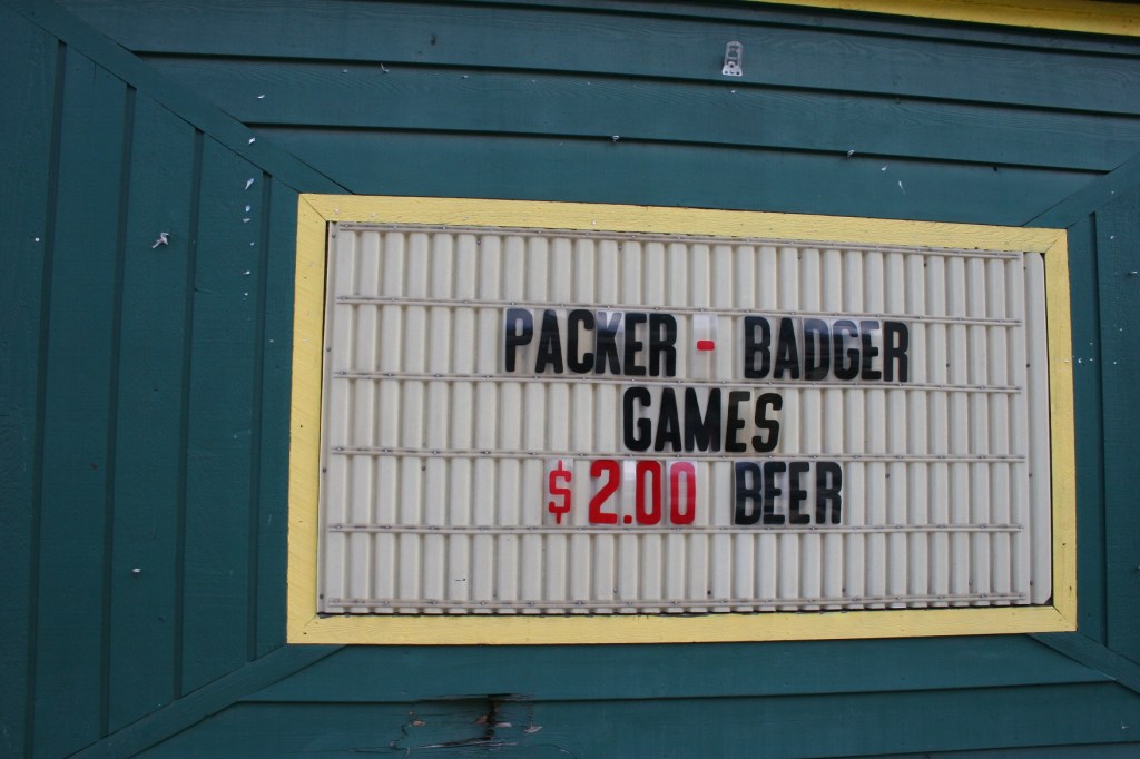 Wisconsinites love their Packers as evidenced by this sign on the corner Packers bar, painted green and gold.