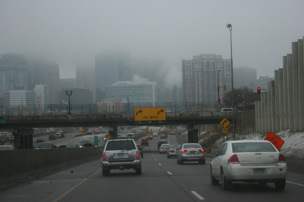 A view of downtown Minneapolis on a foggy Saturday from Interstate 35.