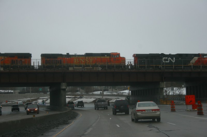 Approaching yet another curve, this one under a railroad overpass.