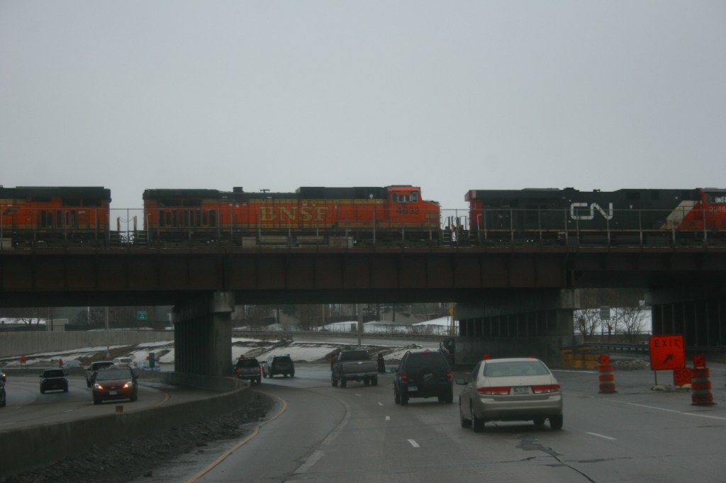 Approaching yet another curve, this one under a railroad overpass.