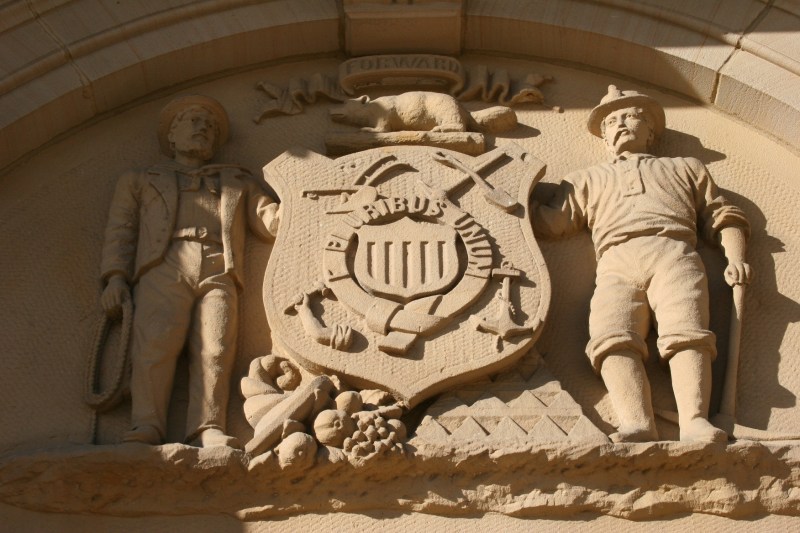 This beautiful stone sculpture rises above the front courthouse entry. Anyone know anything about the sculpture?