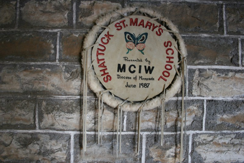 On a wall inside the entry.