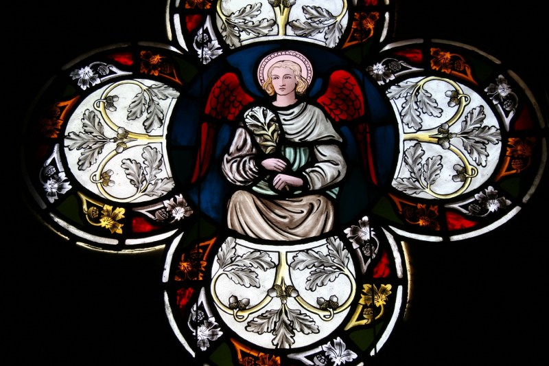 Beautiful stained glass above the exterior entry doors.