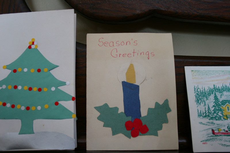 While going through a box of cards my mom had saved, I found several Christmas cards that I made as a child. This year I displayed those cards, along with a vintage card from Schwans