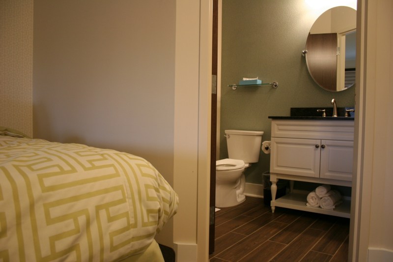 Decor throughout The Inn features earthy shades of green and brown.