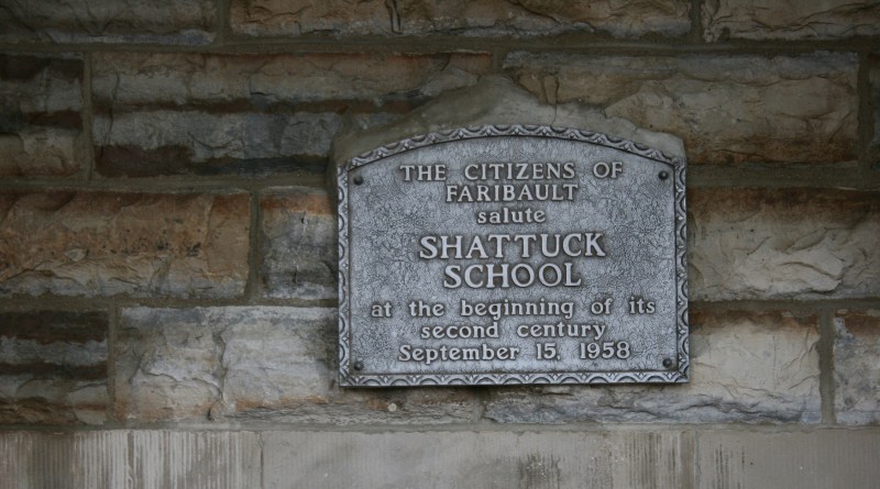 A sign on Shumway Hall notes its centennial anniversary in 1958.