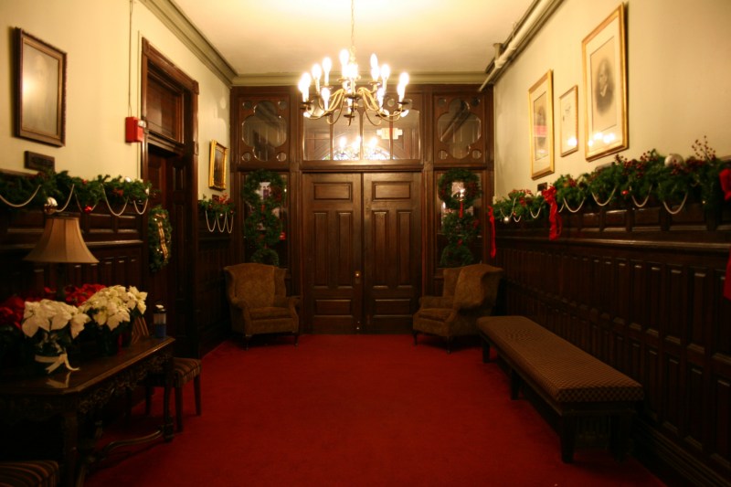 Heavy wood doors dominate the entry to Shumway Hall.