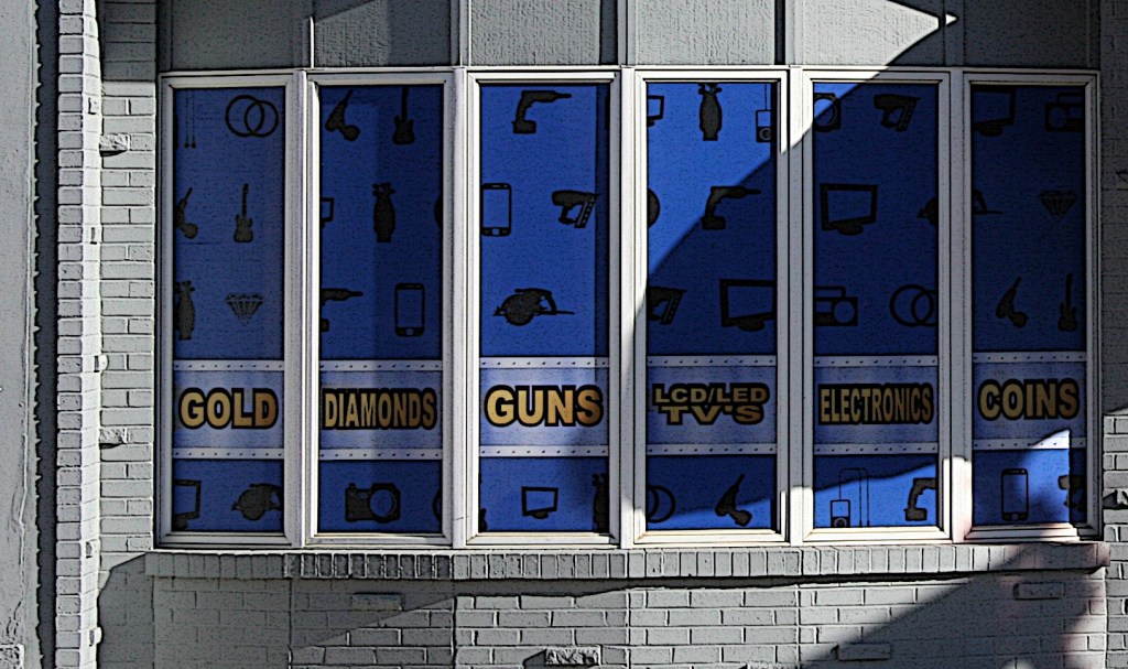 Faribault, Ron's Pawn Shop window close-up