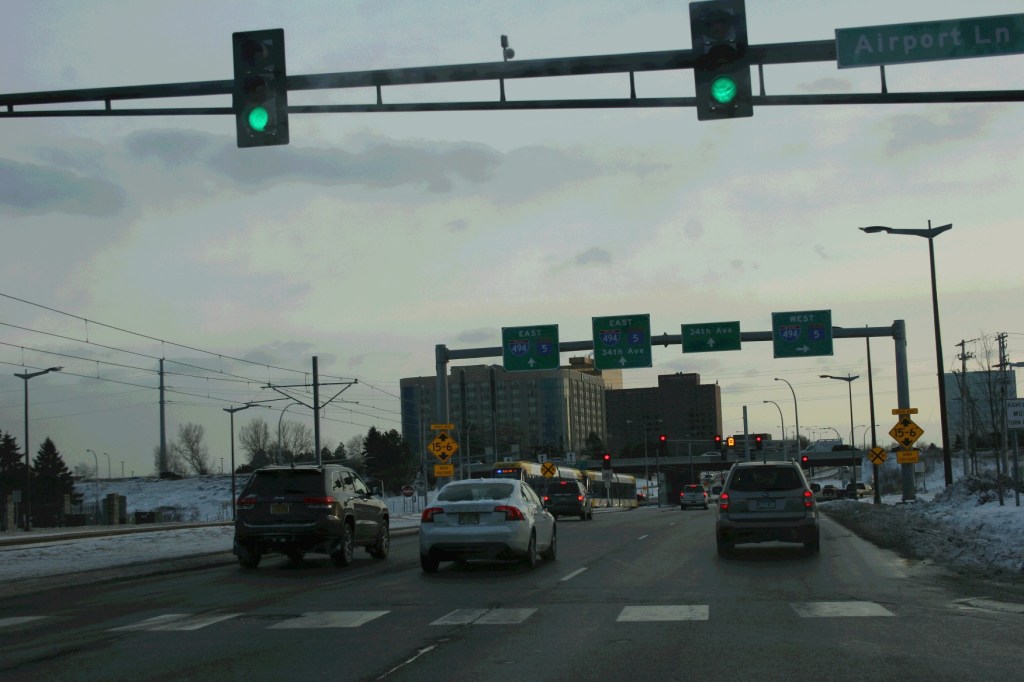 Vehicle traffic and light rail meet at this oddly configured intersection near the Minneapolis-St. Paul International Airport.
