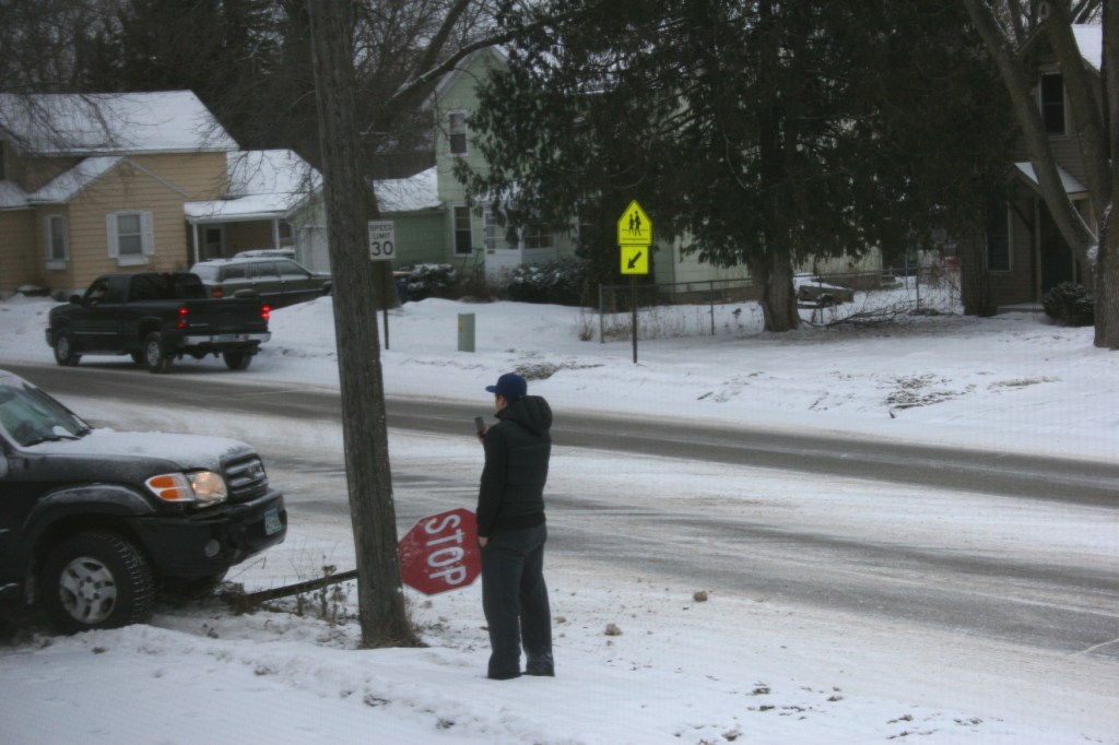 The driver documents the scene with his cell phone.