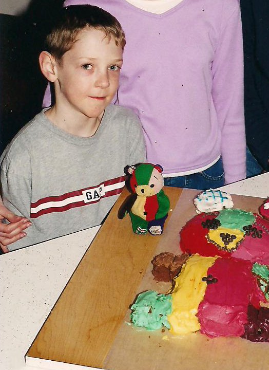For his eighth birthday, Caleb's sisters created a PEEF cake for their brother.