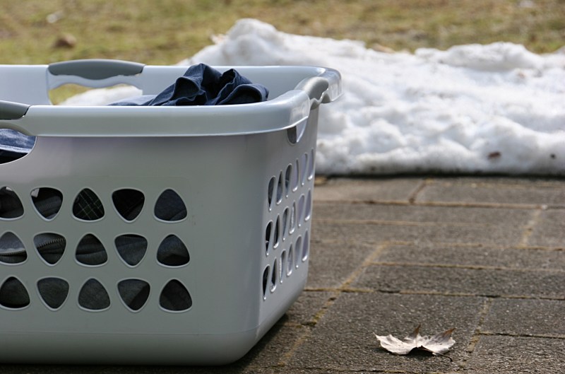 This unstaged image captures the four seasons: summer/spring (lawn), winter (snow pile) and fall (dried leaf).
