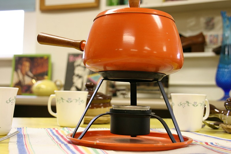 A fondue pot. I remember using a fondue pot in my high school home economics class.