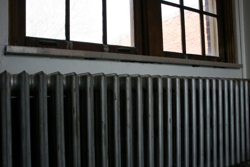 An old radiator and old windows.