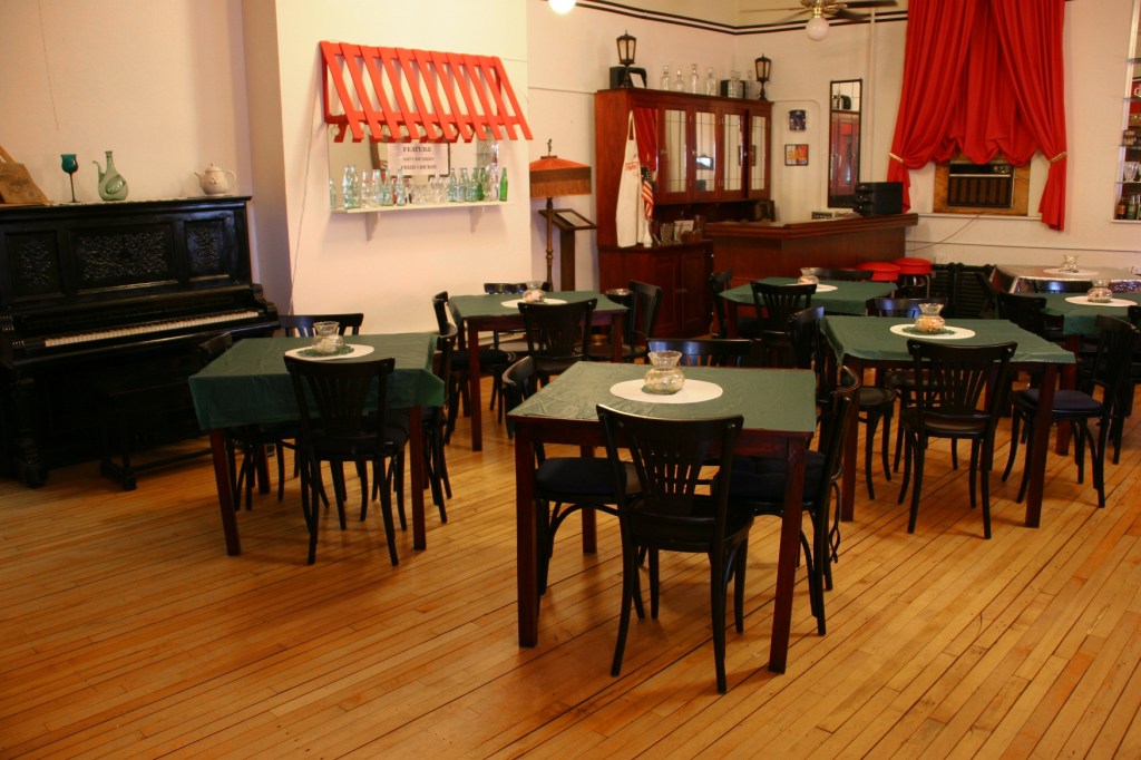 This entire former classroom is set up to look like the 1930s-early 1940s Flame Room once housed in the Concord Hotel. This space can be rented for gatherings.