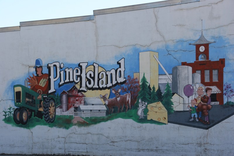 Look closely at this downtown mural and you will see a hunk of cheese, a visual tribute to this community's rich cheese past.