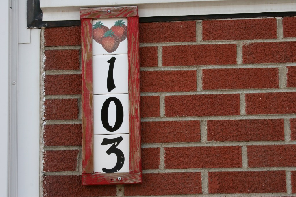 Homespun address signage in Strawberry Point.