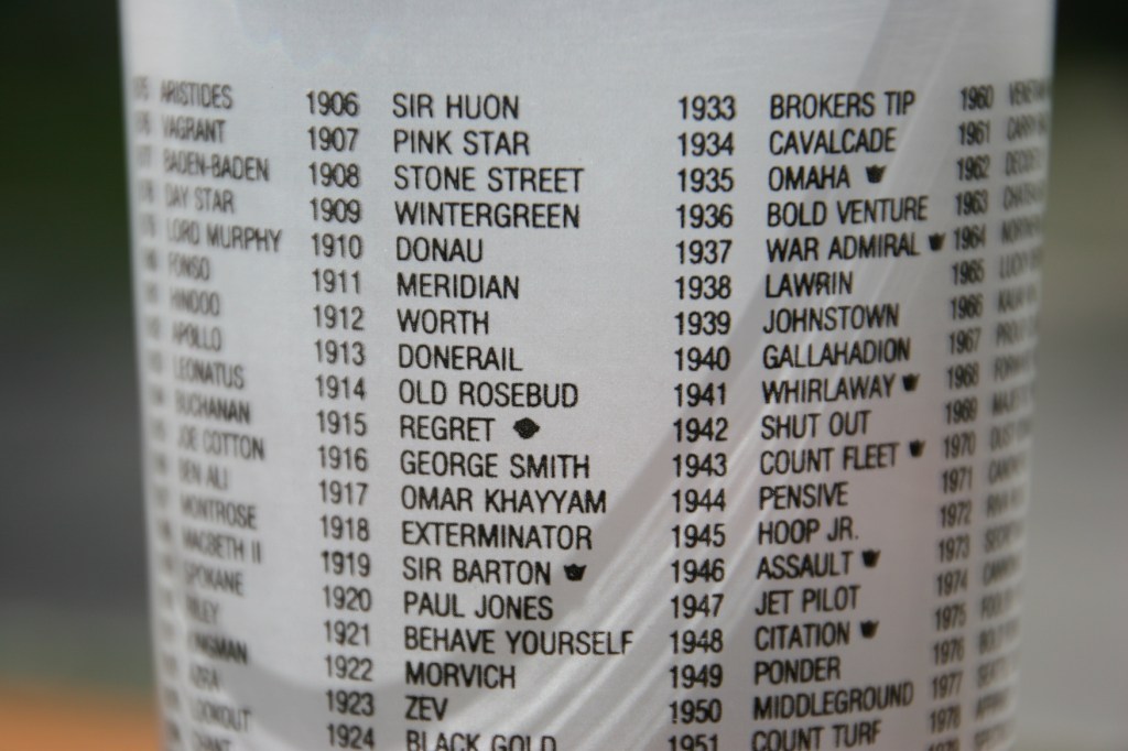 Names of past Derby winners are listed on a commemorative drinking glass gifted to me by my friend Beth Ann.