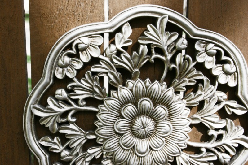 Garden art that stays on my backyard fence year-round.