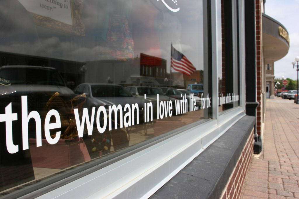 On a downtown shop window.