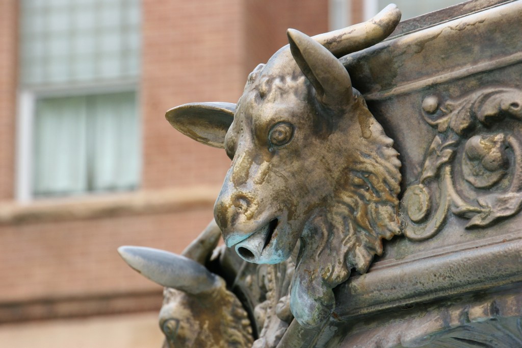 The fountain atop which the Union soldier stands was also built by J. L. Mott Iron Works. It is of French Victorian design. The goat head symbolizes strength and victory.
