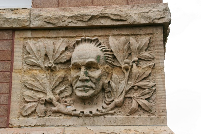 A sculpture on a corner of the courthouse.