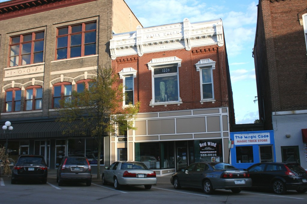 That blue magic store tucked between old buildings caught my eye.