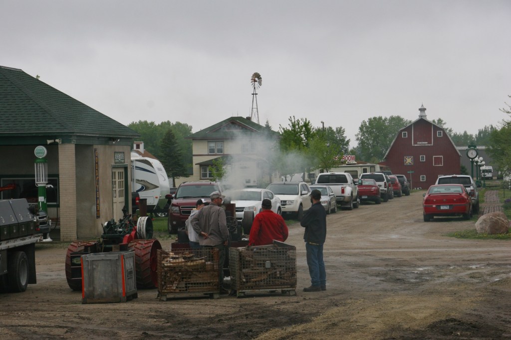 Steam engine enthusiasts await instruction during Steam Engineer School at Heritage Park in Forest City, Iowa.