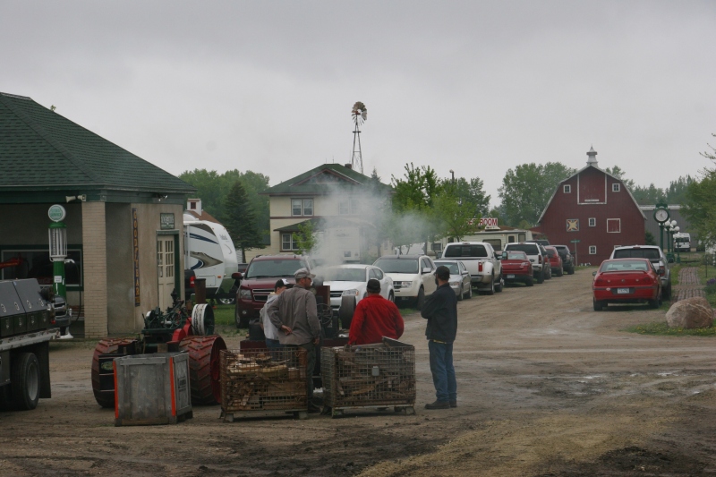 Steam engine enthusiasts await instruction during Steam Engineer School at Heritage Park in Forest City, Iowa.