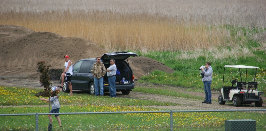 Because of the weather, only a few people flew kites Saturday morning.