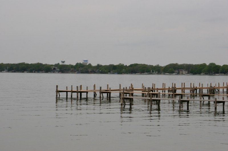 The public dock stretches and corners into Clear Lake.