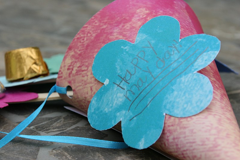 The first May Day basket to arrive included four construction paper flowers with candy centers.
