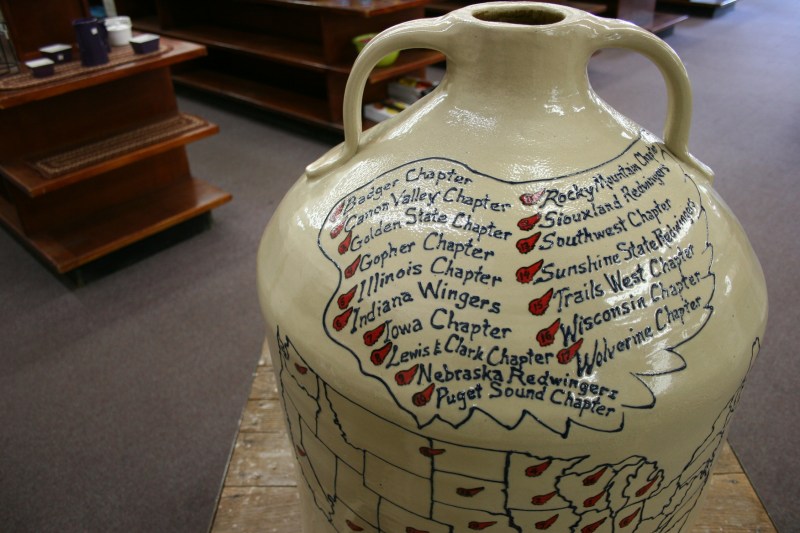 A large jug inside the pottery store lists chapters of the Red Wing Collectors Society.